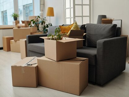 Neatly organized moving boxes in a living room
